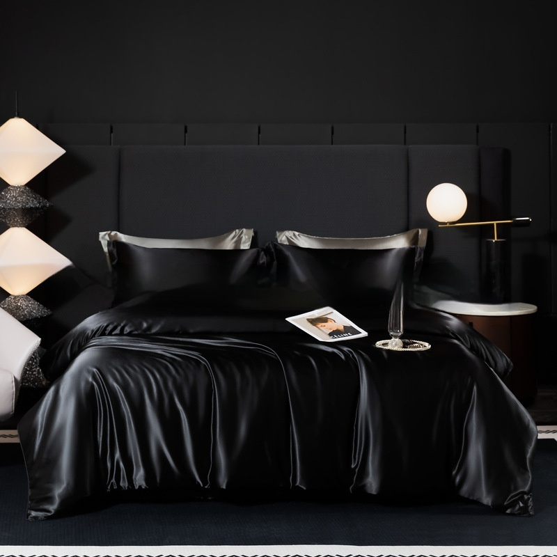 Parure de lit en soie 100% naturelle, couleur Ébène – drap-housse, housse de couette et taies d’oreiller pour un sommeil luxueux et une peau sublimée.